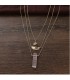 Collier multi rang en zinc doré, pendentif en quartz rose et breloque plume