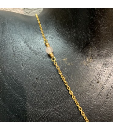 Collier en acier inoxydable doré et son pendentif Carré en quartz rose