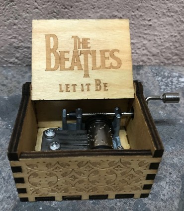 Boîte à musique à thème ouverte des Beatles. Découvrez "let it be"