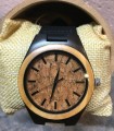 Montre en bois d'ébène, d'olivier et liège